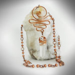 Hand crafted quartz and copper swirl necklace